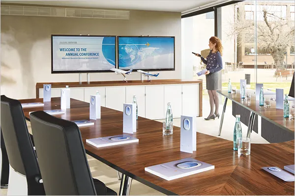 buero_praeesentieren Präsentationstechnik, Büromöbel, Büroeinrichtung, ergonomische Bürostühle, höhenverstellbare Schreibtische, Ruhezone, Lounge Möbel, Raum in Raum System